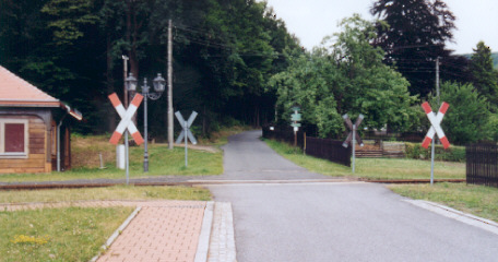 Next to the stop there is this level crossing